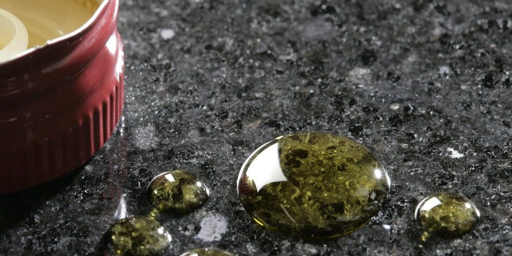 Olive oil on quartz surface Olive oil on quartz surface