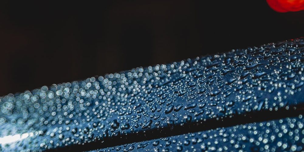 Water droplets on a car Water droplets on a car