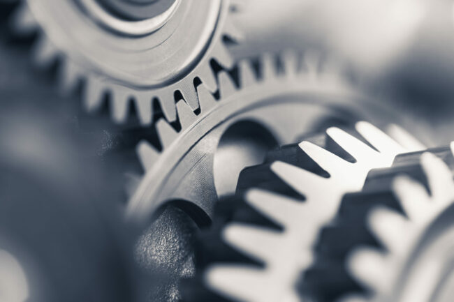 engine gear wheels, industrial background Industrial gears